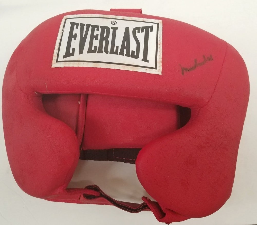 Muhammad Ali Autographed Everlast Headgear with JSA Authentication: Muhammad Ali Autographed Everlast Headgear with JSA Authentication This is an original autographed headgear by boxing legend Muhammad Ali. Authenticated by James Spence Authentication (JSA), this item