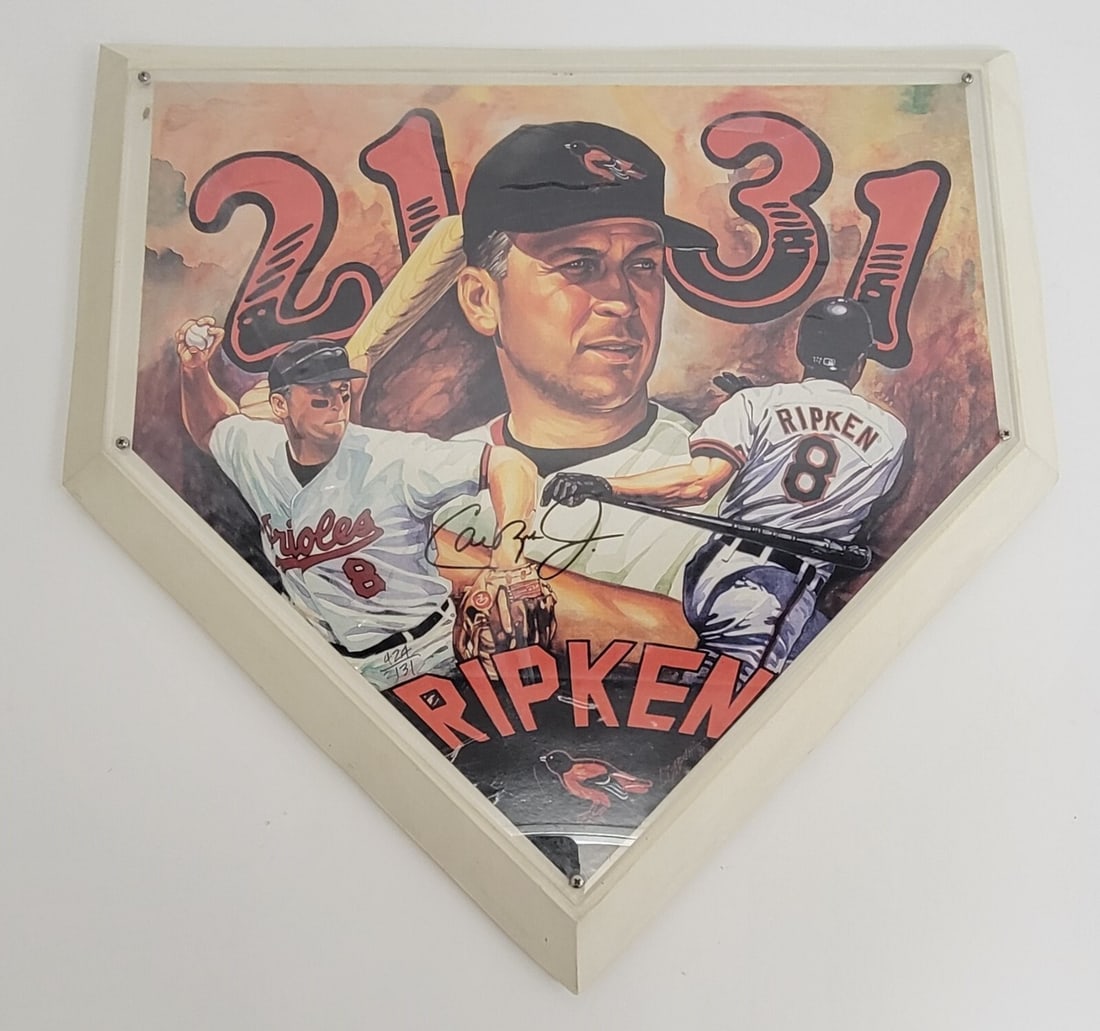 Cal Ripken Jr. Signed Limited Edition Commemorative Home Plate #424/2131: Cal Ripken Jr. Signed Limited Edition Commemorative Home Plate #424/2131 Celebrate the legacy of baseball legend Cal Ripken Jr. with this autographed commemorative home plate. This unique piece is a l