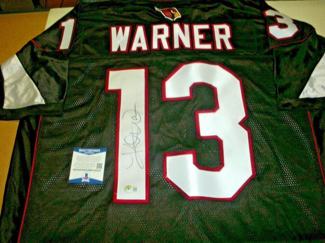 Kurt Warner Signed Arizona Cardinals Reebok Jersey Beckett Authenticated: Kurt Warner Signed Arizona Cardinals Reebok Jersey Beckett Authenticated This officially licensed Reebok jersey features the signature of Kurt Warner, a legendary player in the NFL. Authenticated by B