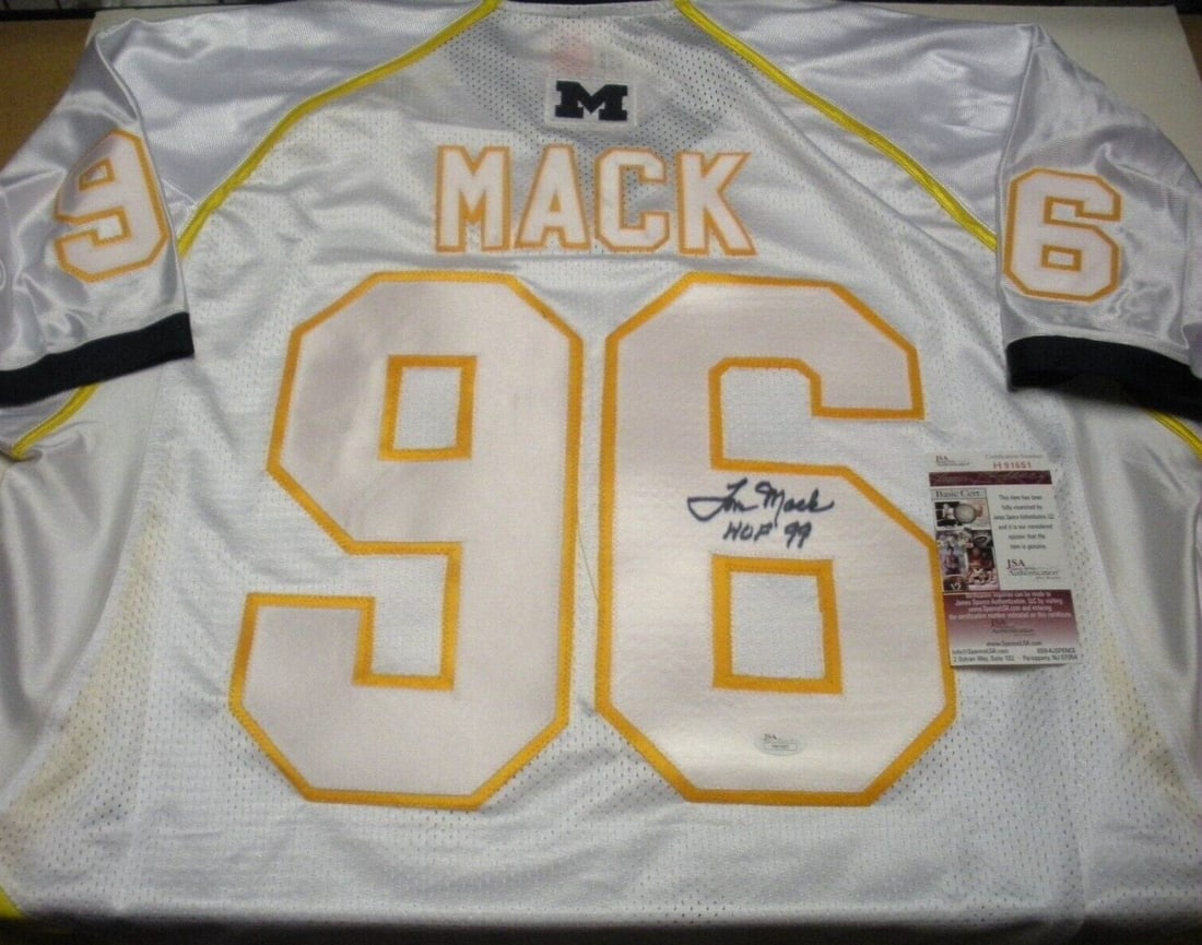 Tom Mack Signed Michigan Wolverines Jersey JSA Certified: Tom Mack Signed Michigan Wolverines Jersey JSA Certified This officially licensed Adidas jersey, signed by Tom Mack, is a remarkable piece for any Michigan Wolverines fan and football enthusiast. It f