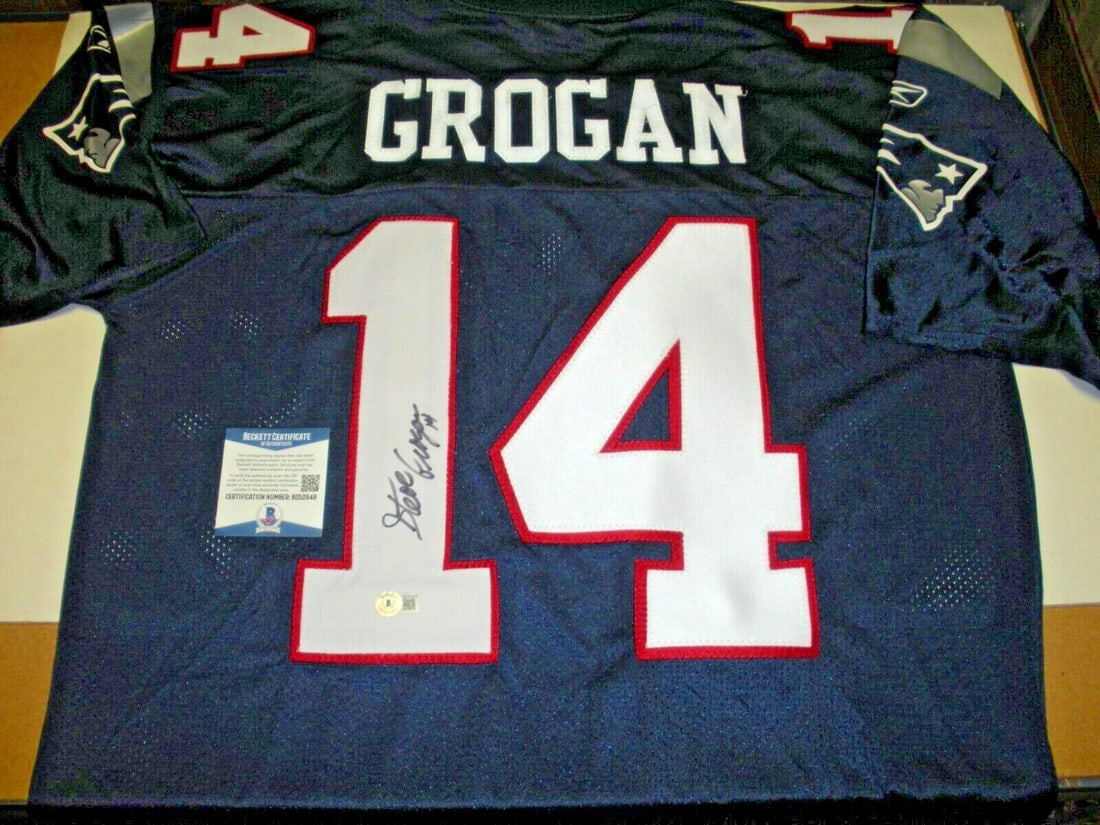 Steve Grogan Signed Reebok Jersey with Beckett COA: Steve Grogan Signed Reebok Jersey with Beckett COA This official licensed Reebok jersey is a collectible piece from the New England Patriots, featuring the signature of former quarterback Steve Grogan