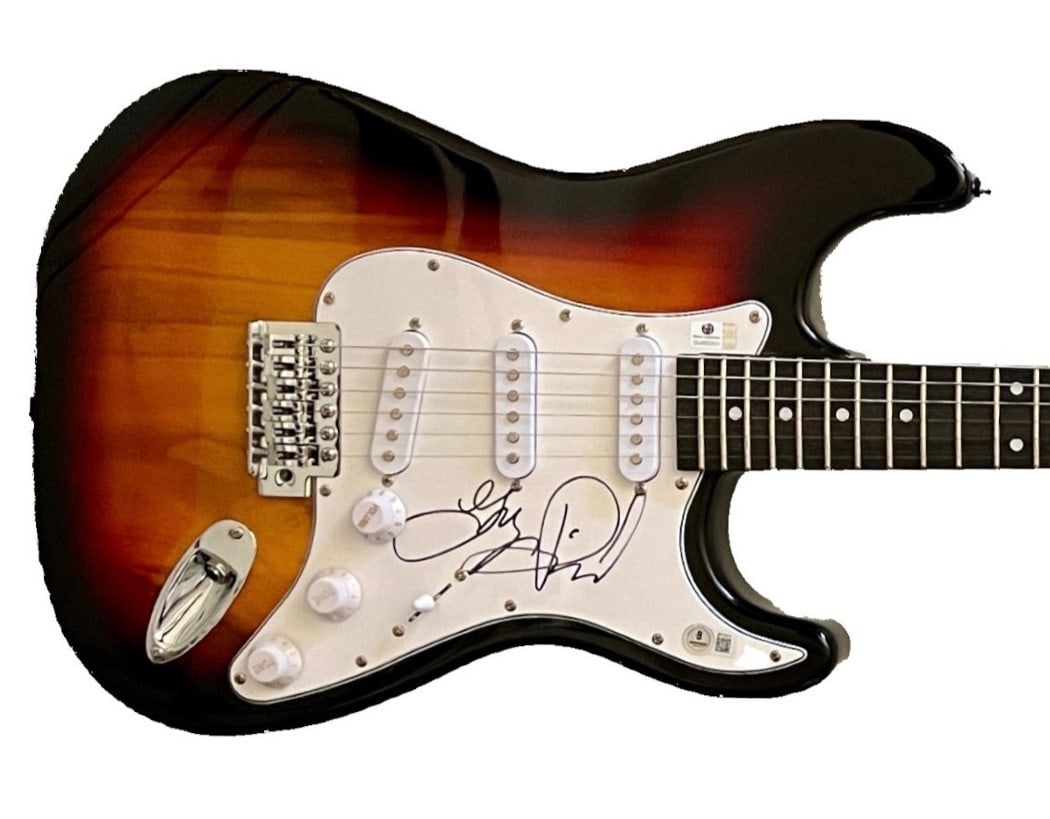 Terry Reid Autographed Electric Guitar Beckett Authenticated: Terry Reid Autographed Electric Guitar Beckett Authenticated This is an authentic Terry Reid autographed electric guitar, a rare piece for music enthusiasts and collectors. The guitar has been authent