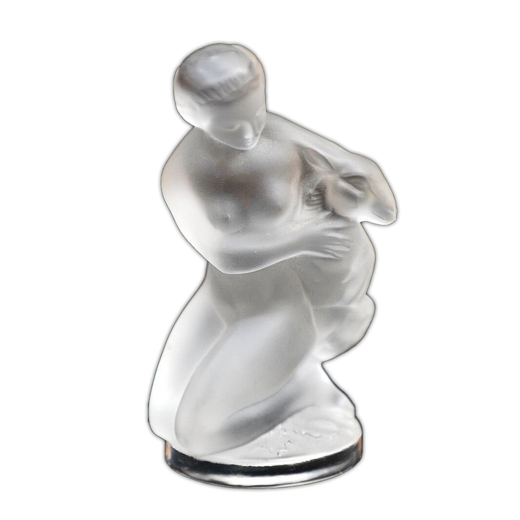 Lalique Nude Lady Diane Figurine with Fawn Clear Crystal: Lalique Nude Lady Diane Figurine with Fawn Clear Crystal This exquisite Lalique figurine, titled "Nude Lady Diane with Fawn," showcases the brand's celebrated craftsmanship. Made from clear glass, thi