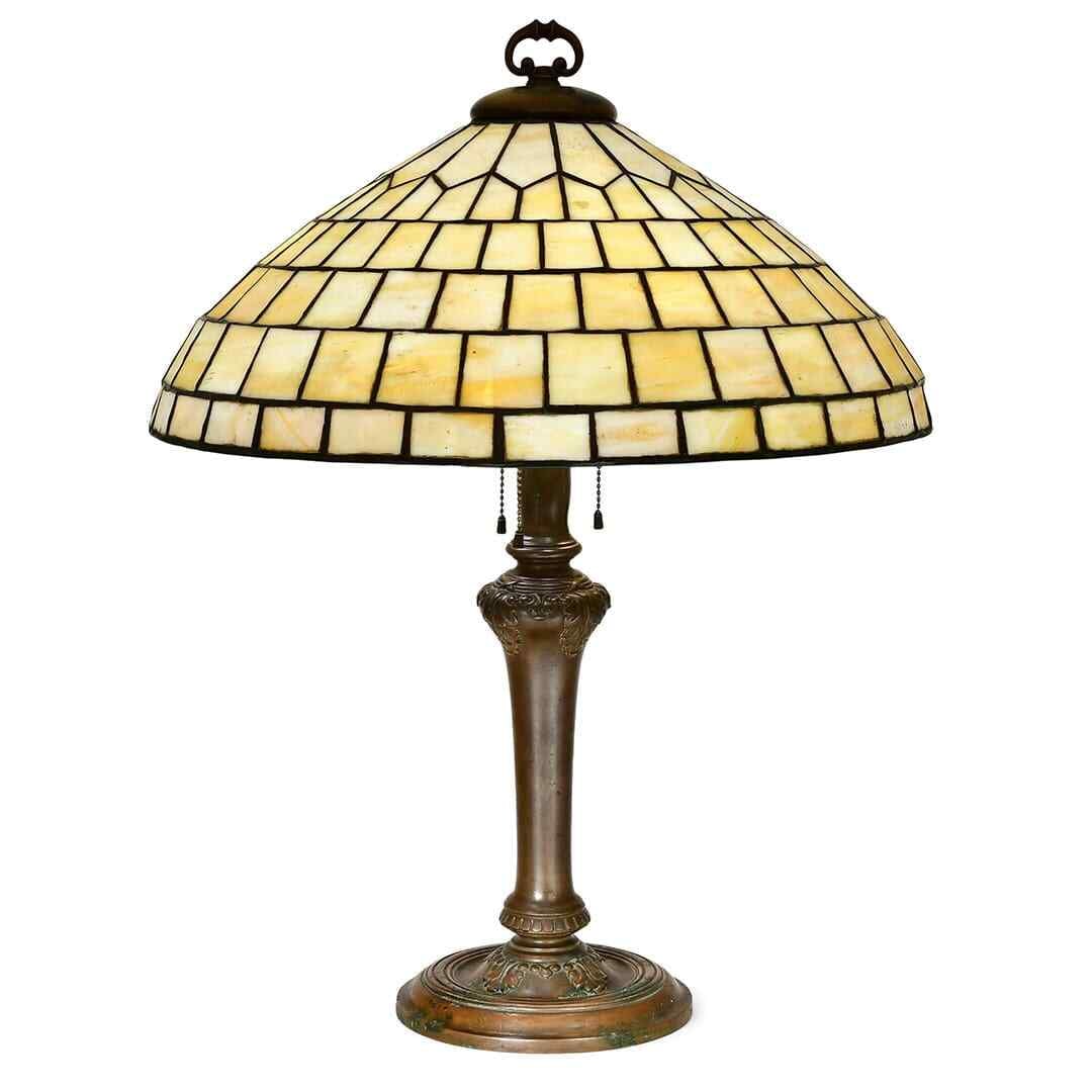 Antique Duffner & Kimberly Geometric Table Lamp with Handel Base: Antique Duffner & Kimberly Geometric Table Lamp with Handel Base This exquisite early 20th-century table lamp showcases a stunning leaded glass shade crafted by Duffner & Kimberly Co., elegantly paire