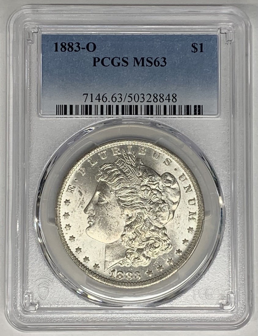 1883-O Morgan Silver Dollar Coin PCGS MS 63 Uncirculated: 1883-O Morgan Silver Dollar Coin PCGS MS 63 Uncirculated This 1883-O Morgan Silver Dollar Coin is a stunning piece of numismatic history, graded MS 63 by PCGS, ensuring its uncirculated quality. The c