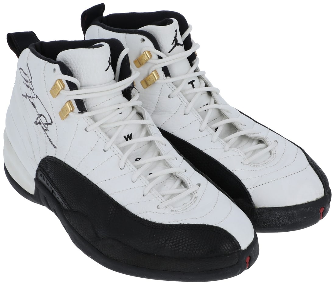 Michael Jordan Signed Game Used Air Jordan XII Sneakers with COA: Michael Jordan Signed Game Used Air Jordan XII Sneakers with COA Own a piece of basketball history with these game-used, twice-signed 1997 Air Jordan XII sneakers worn by Michael Jordan during the ico