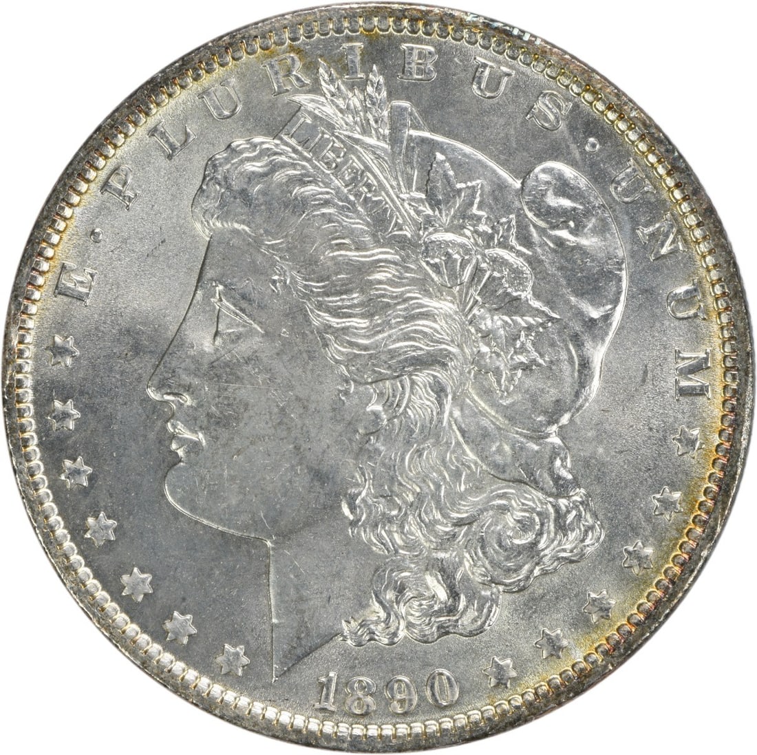 1890 Morgan Silver Dollar Choice BU Uncertified Silver Coin: 1890 Morgan Silver Dollar Choice BU Uncertified Silver Coin This 1890 Morgan Silver Dollar is a stunning piece, recognized for its historical significance and beauty. It is classified as Choice BU (Br