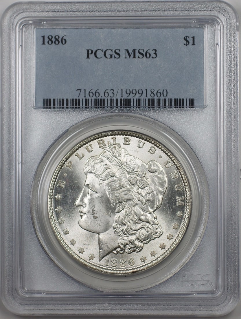 1886 Morgan Silver Dollar $1 Coin PCGS MS 63 Uncirculated: 1886 Morgan Silver Dollar $1 Coin PCGS MS 63 Uncirculated This 1886 Morgan Silver Dollar is a stunning representation of American numismatic history. Graded MS-63 by PCGS, this uncirculated coin showc