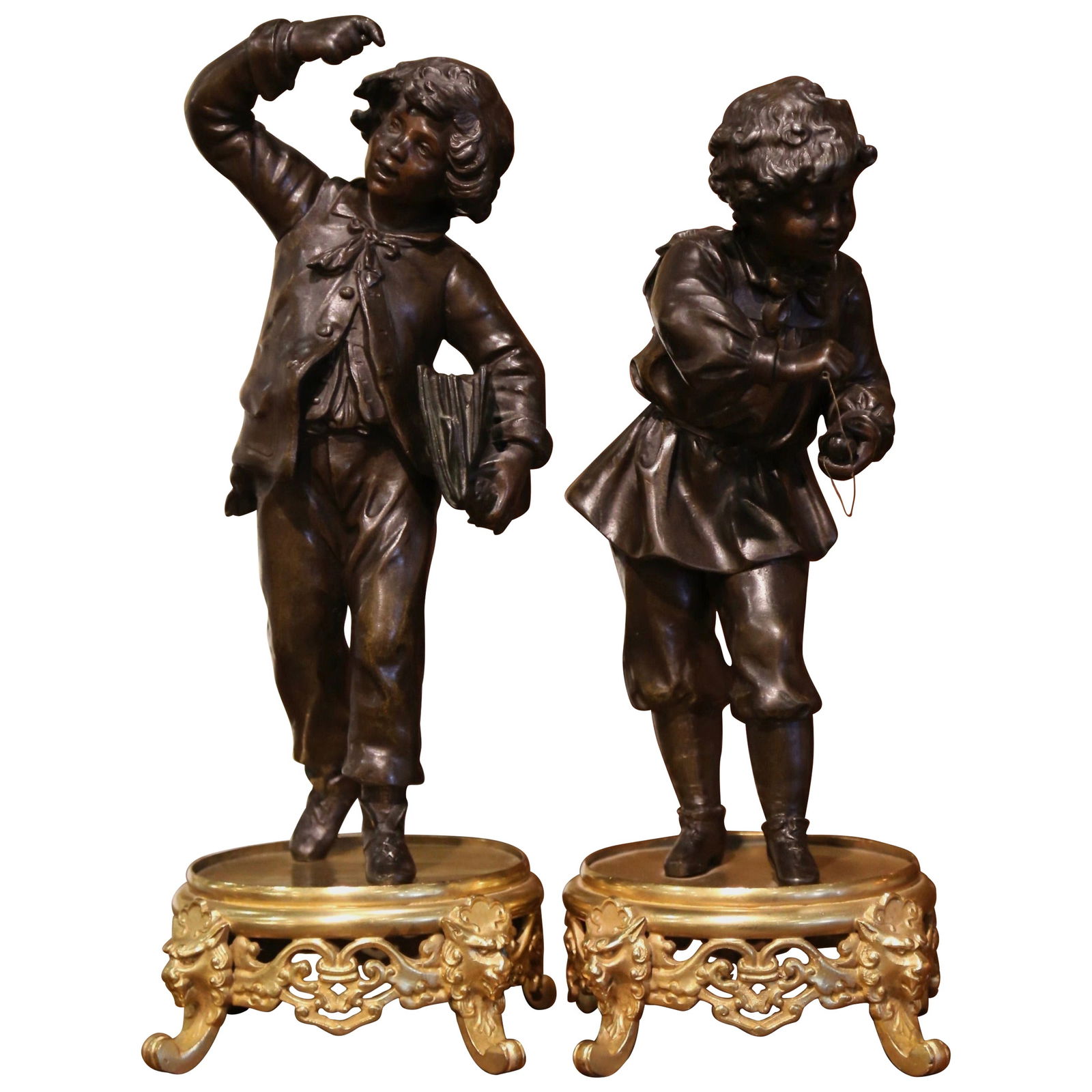 19th Century French Spelter Figures Set of 2 on Gilt Bronze Bases: 19th Century French Spelter Figures Set of 2 on Gilt Bronze Bases This exquisite set of 19th-century French spelter figures is a captivating addition to any decor. Crafted in France around 1880, the p