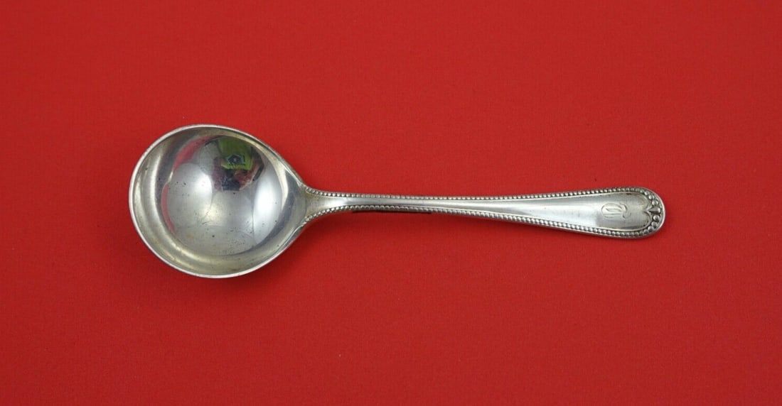 Gorham Newcastle Sterling Silver Bouillon Spoon 5.5 Inches Monogrammed: Gorham Newcastle Sterling Silver Bouillon Spoon 5.5 Inches Monogrammed This exquisite Newcastle Bouillon Soup Spoon is crafted from sterling silver by Gorham, showcasing the elegant Newcastle pattern.