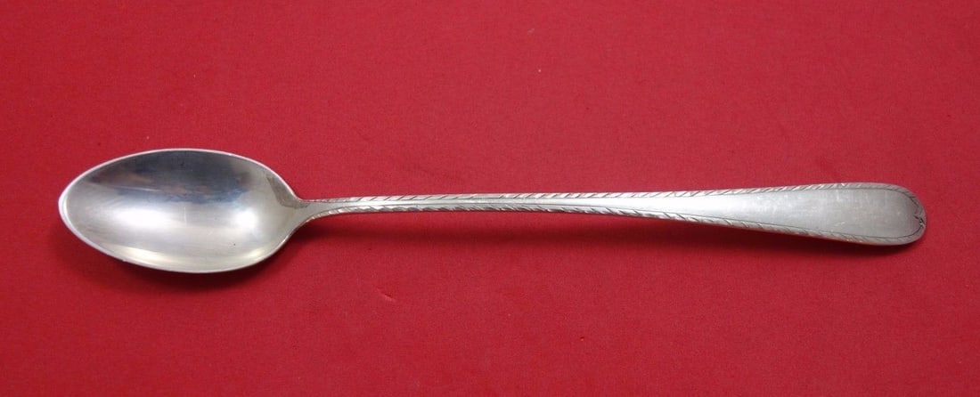 Gorham Feather Edge Sterling Silver Iced Tea Spoon 7 5/8": Gorham Feather Edge Sterling Silver Iced Tea Spoon 7 5/8" This exquisite iced tea spoon from the renowned Gorham brand features a stunning Feather Edge design, also known as Dolly Madison. Crafted fro