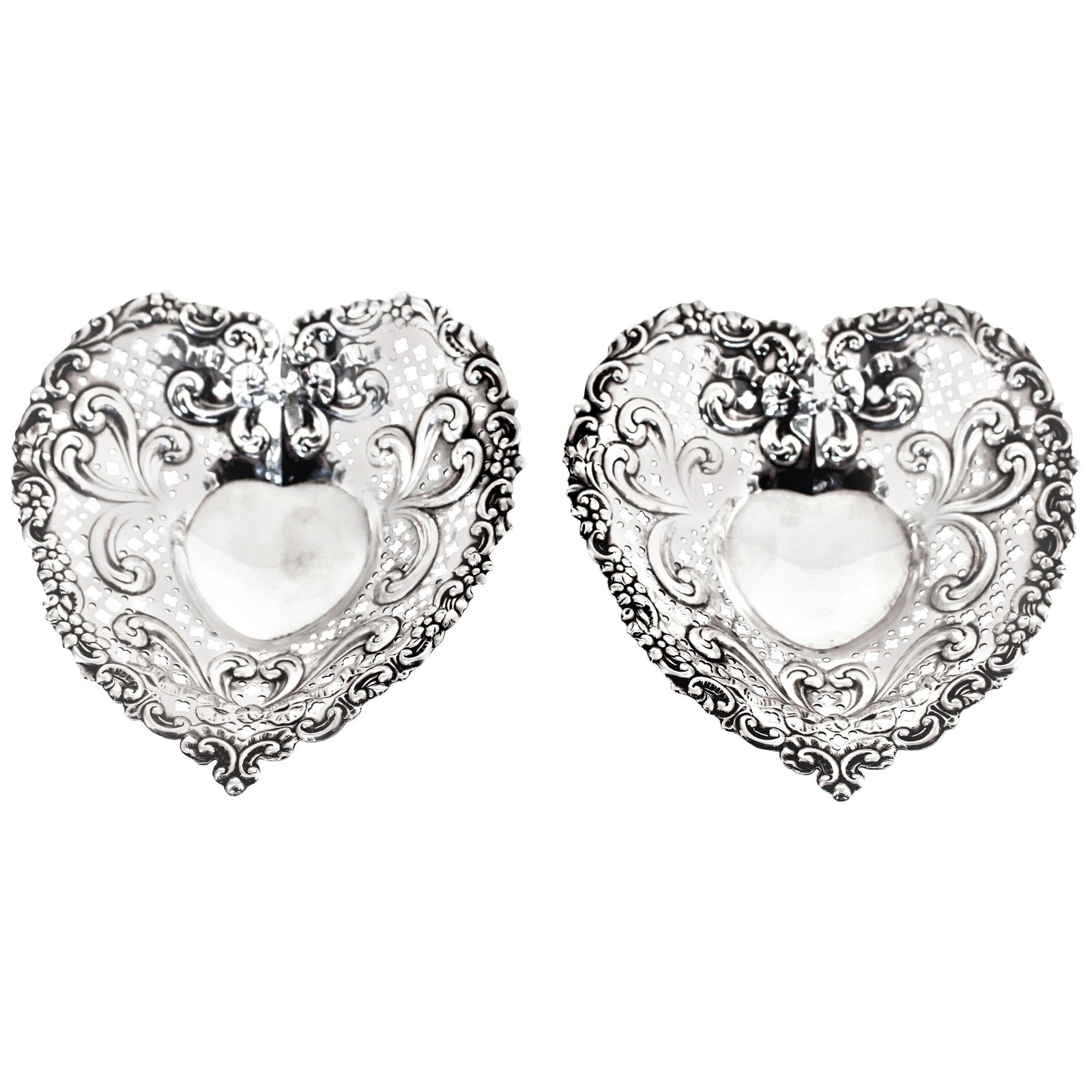 Gorham Sterling Silver Heart Dishes Set of 2 1920s: Gorham Sterling Silver Heart Dishes Set of 2 1920s Discover a charming pair of heart-shaped candy dishes by Gorham Manufacturing Company, perfect for expressing love any day of the year. These delight