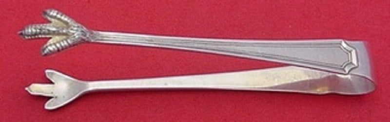 Durgin-Gorham Fairfax Sterling Silver Sugar Tong 4.5 Inch Serving Piece: Durgin-Gorham Fairfax Sterling Silver Sugar Tong 4.5 Inch Serving Piece This exquisite 4 1/2" sugar tong is crafted from sterling silver and features the elegant Fairfax pattern by Durgin-Gorham. Dati