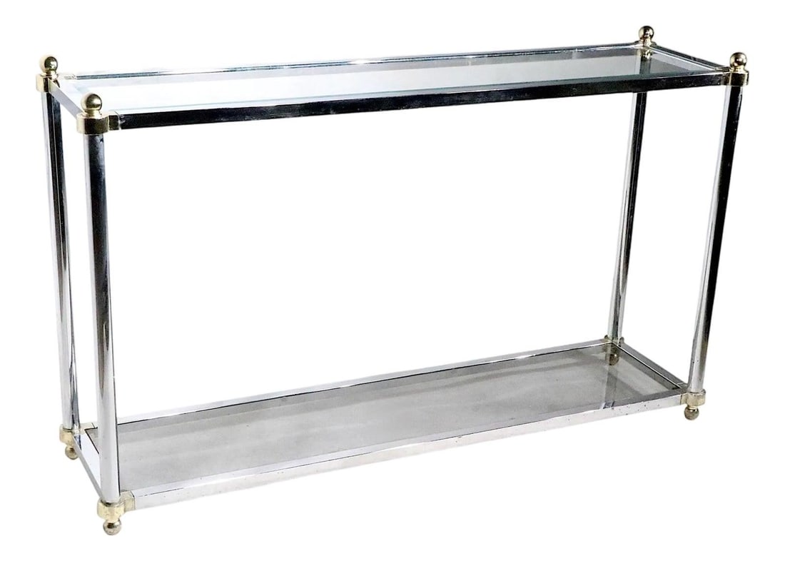 1970s Hollywood Regency Chrome Brass Glass Console Table: 1970s Hollywood Regency Chrome Brass Glass Console Table Elevate your living space with this chic Hollywood Regency style console table, featuring a striking chrome plated frame complemented by brass