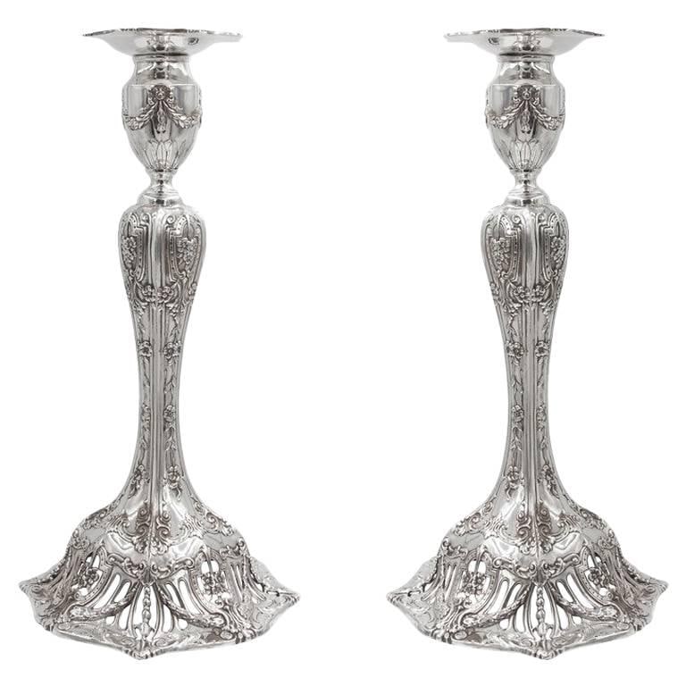 Elegant Sterling Silver Candlestick Set of 2 by Graff Washbourne & Dunn: Elegant Sterling Silver Candlestick Set of 2 by Graff Washbourne & Dunn Enhance your space with these magnificent candlesticks, a stunning addition to any decor. Crafted from sterling silver, this exq