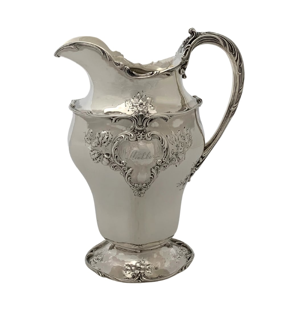 Antique Gorham 925 Sterling Silver Engraved Floral Pitcher: Antique Gorham 925 Sterling Silver Engraved Floral Pitcher This exquisite antique Gorham pitcher showcases the artistry of handmade craftsmanship in 925 sterling silver. Adorned with beautifully engra
