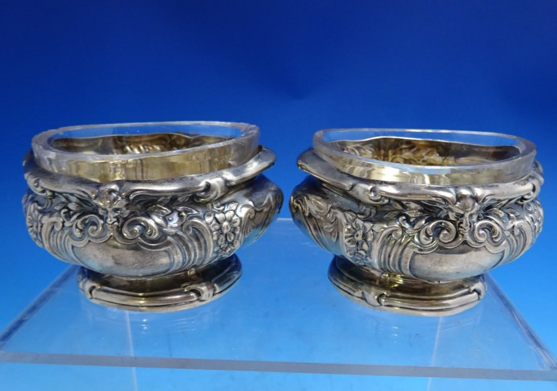 Gorham Sterling Silver Master Salt Dip Pair with Glass Liners: Gorham Sterling Silver Master Salt Dip Pair with Glass Liners Enhance your dining experience with this exquisite pair of Gorham Sterling Silver salt dips. Each piece features a stunning figural motif,