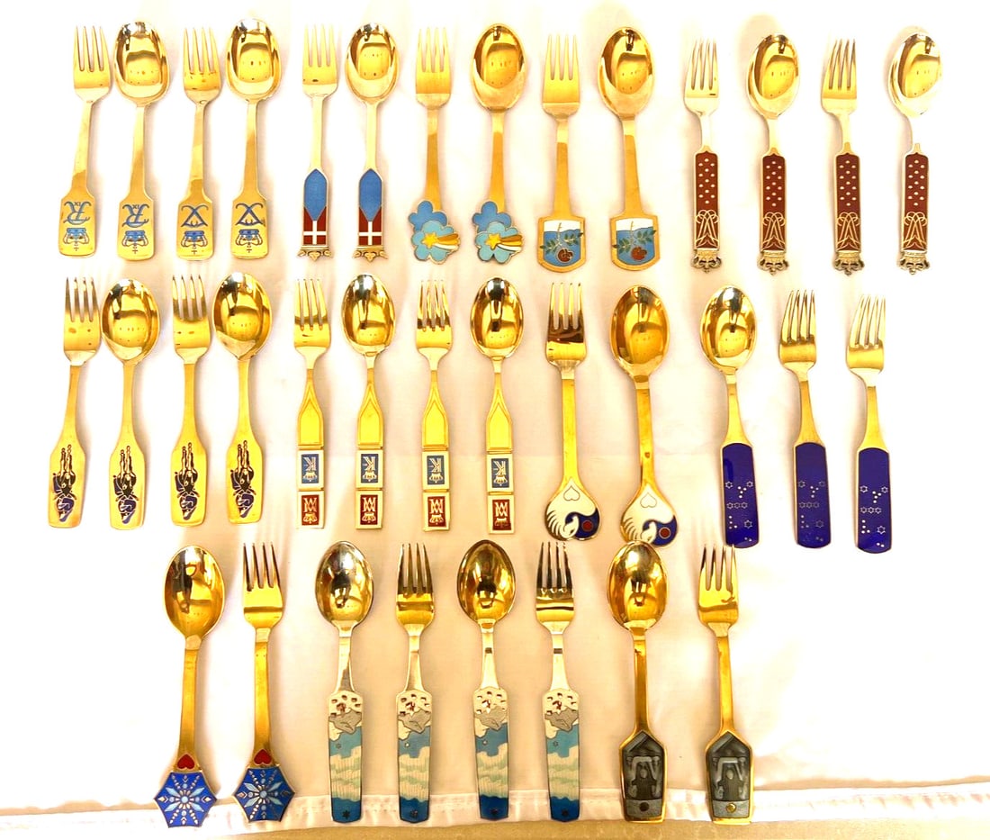 Anton Michelsen 36 Piece Sterling Silver Enameled Gold Plated Flatware Set: Anton Michelsen 36 Piece Sterling Silver Enameled Gold Plated Flatware Set Discover this stunning 36-piece collection of Anton Michelsen Danish flatware, featuring beautifully crafted sterling silver