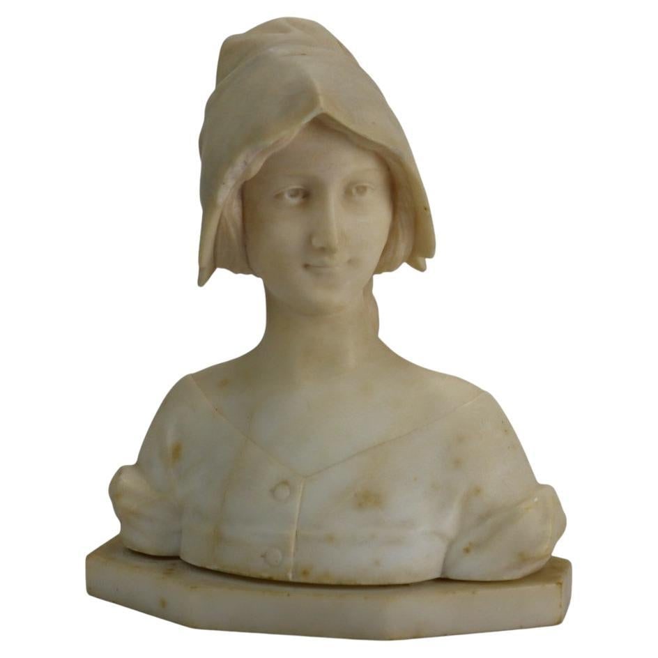 19th Century Antique Marble Bust of Joan of Arc: 19th Century Antique Marble Bust of Joan of Arc This exquisite antique carved marble bust of Joan of Arc dates back to the 19th century, showcasing exceptional craftsmanship. The intricate detailing h