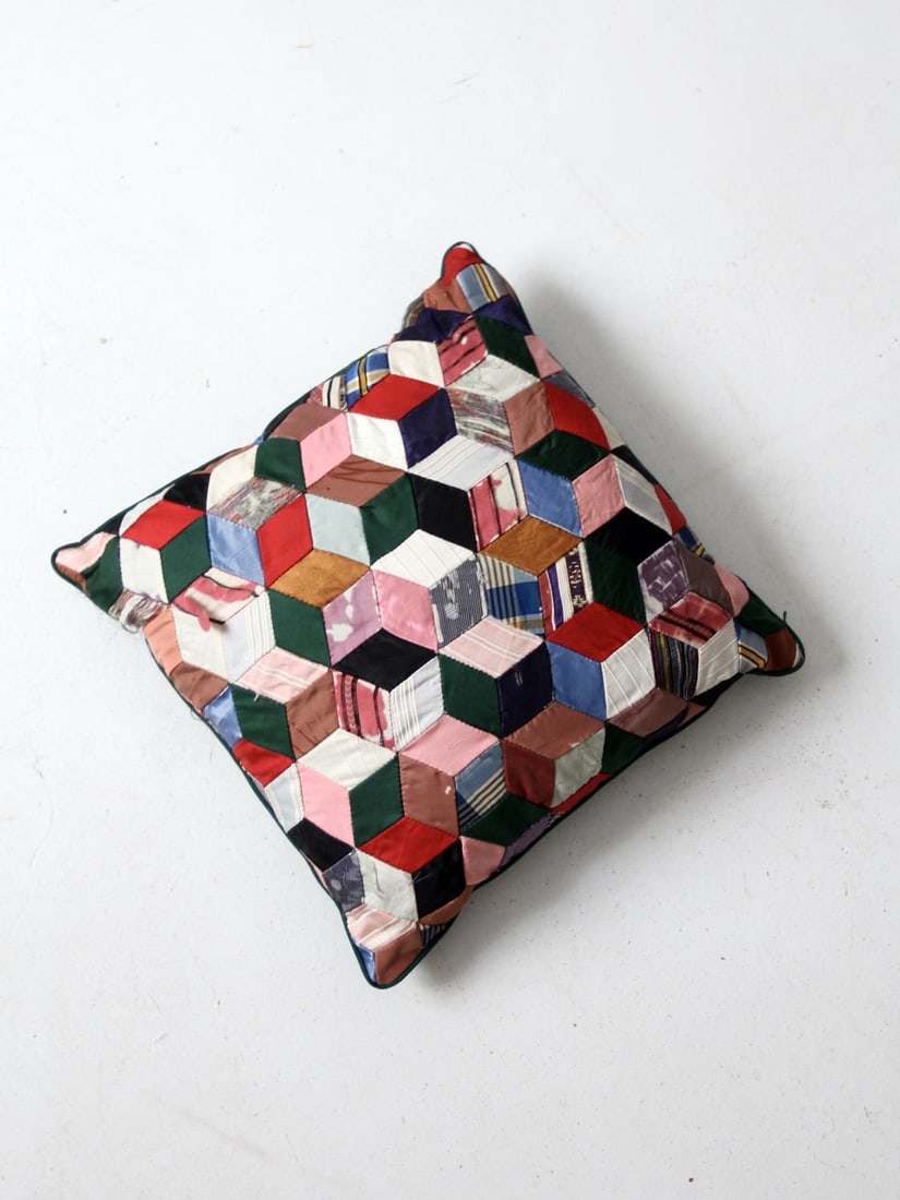 Victorian Era Tumbling Blocks Quilt Throw Pillow: Victorian Era Tumbling Blocks Quilt Throw Pillow This vintage throw pillow showcases a beautiful Victorian era quilt textile, featuring a charming tumbling blocks quilt pattern crafted from a blend of