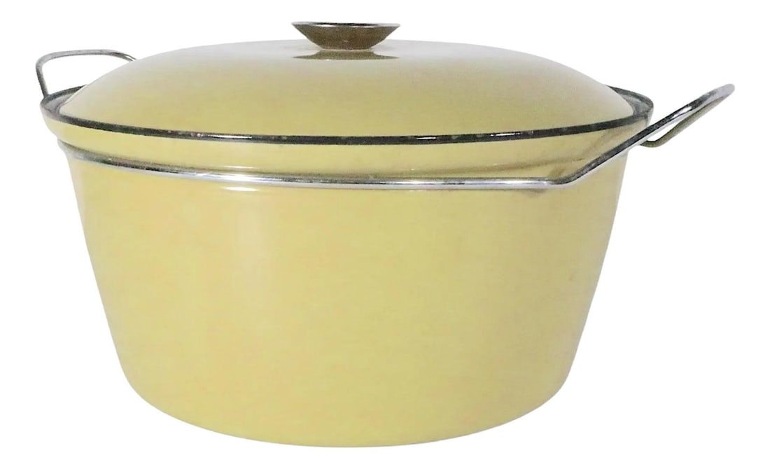 Large Yellow Enameled Casserole by Cathrineholm Norway 1960s: Large Yellow Enameled Casserole by Cathrineholm Norway 1960s This large Mid Century covered casserole pot by Cathrineholm showcases a vibrant yellow enamel finish, making it a striking addition to you