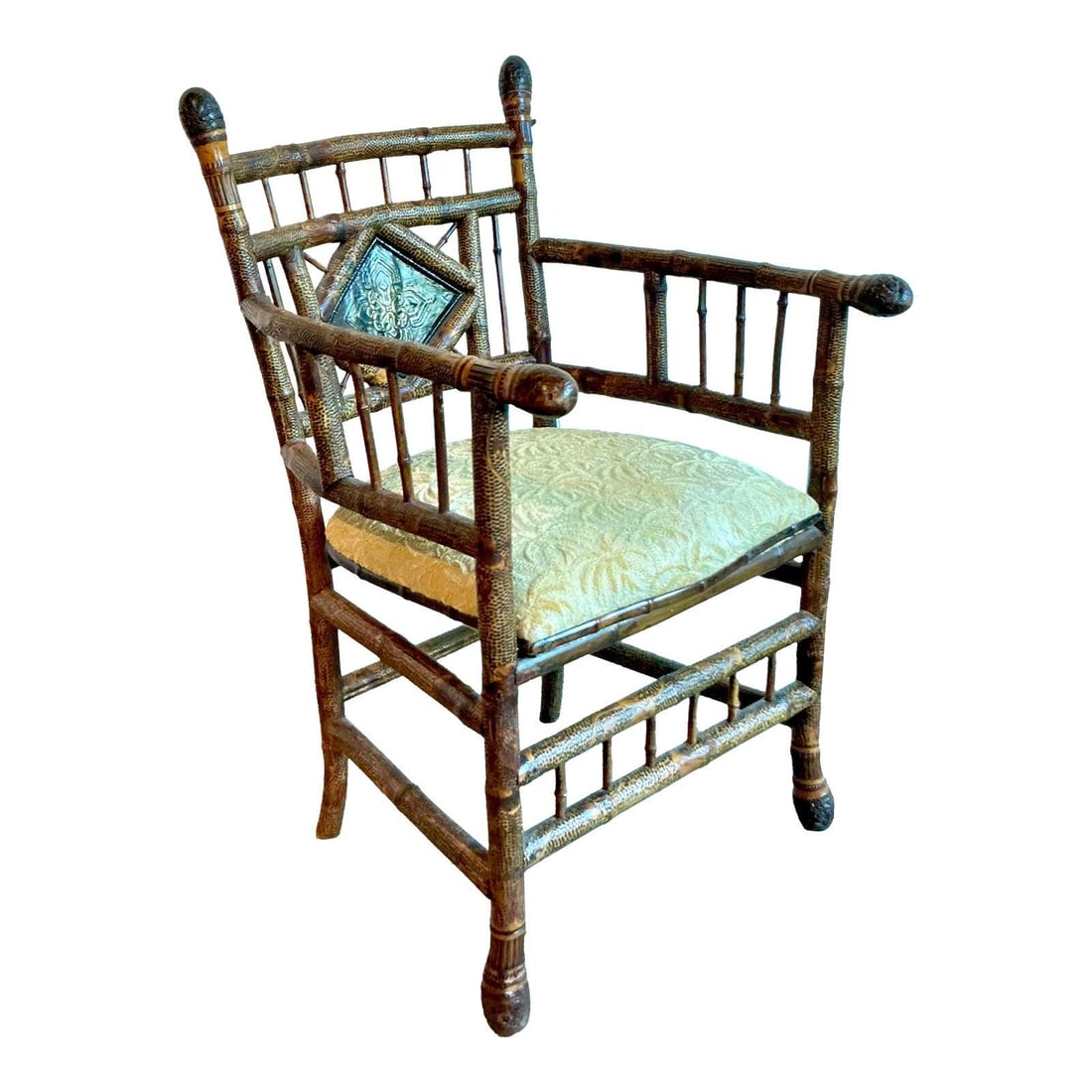 Vintage Aesthetic Movement Bamboo Arm Chair with Eglomise Panel: Vintage Aesthetic Movement Bamboo Arm Chair with Eglomise Panel This vintage armchair is a striking representation of the Aesthetic Movement, showcasing a masterful Chinoiserie design. Crafted from tu
