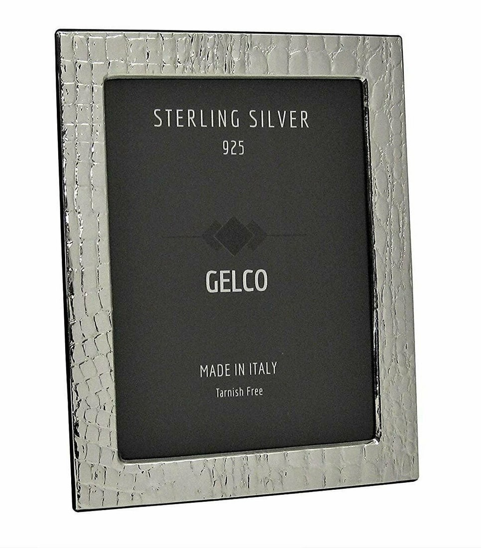 Gelco 925 Sterling Silver Wooden Leather Picture Frame 4x6: Gelco 925 Sterling Silver Wooden Leather Picture Frame 4x6 Showcase your favorite memories with this elegant Gelco Italian 925 Sterling Silver and wooden leather design picture frame. This stylish pho