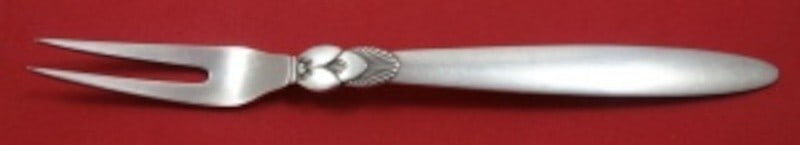 Georg Jensen Cactus Sterling Silver 2-Tine Serving Fork GI/GJ Mark 6 1/8": Georg Jensen Cactus Sterling Silver 2-Tine Serving Fork GI/GJ Mark 6 1/8" This exquisite serving fork from the Cactus pattern by Georg Jensen is crafted from sterling silver. Designed by sculptor Gund