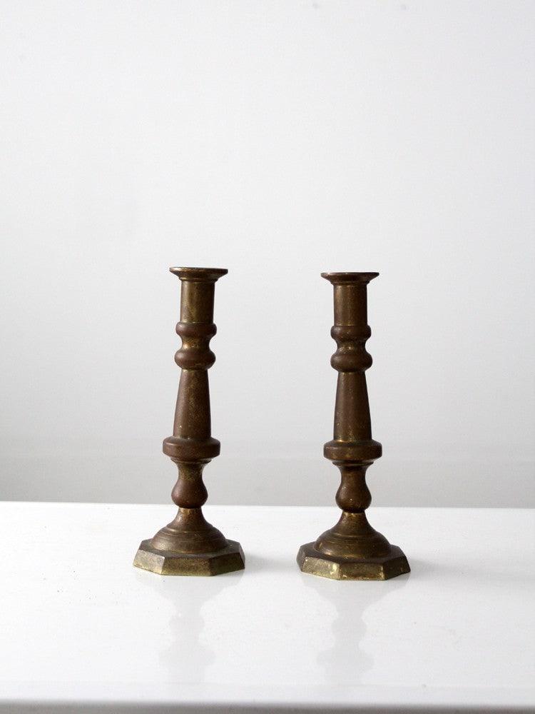 Grand Antique Baroque Brass Candlestick Holders Pair 11 Inches: Grand Antique Baroque Brass Candlestick Holders Pair 11 Inches This exquisite pair of antique brass candlestick holders showcases a classic Baroque style with a grand size and elegant turned vase-styl