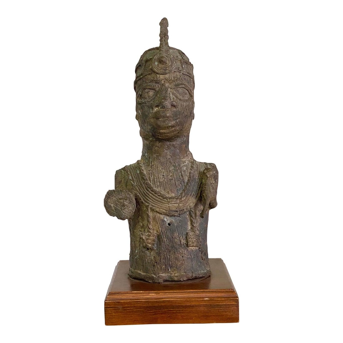 Mid 20th Century Bronze Tribal Sculpture on Wooden Base: Mid 20th Century Bronze Tribal Sculpture on Wooden Base This Mid 20th Century Vintage Bronze Tribal Sculpture is a captivating representation of traditional craftsmanship. Made from bronze, it feature