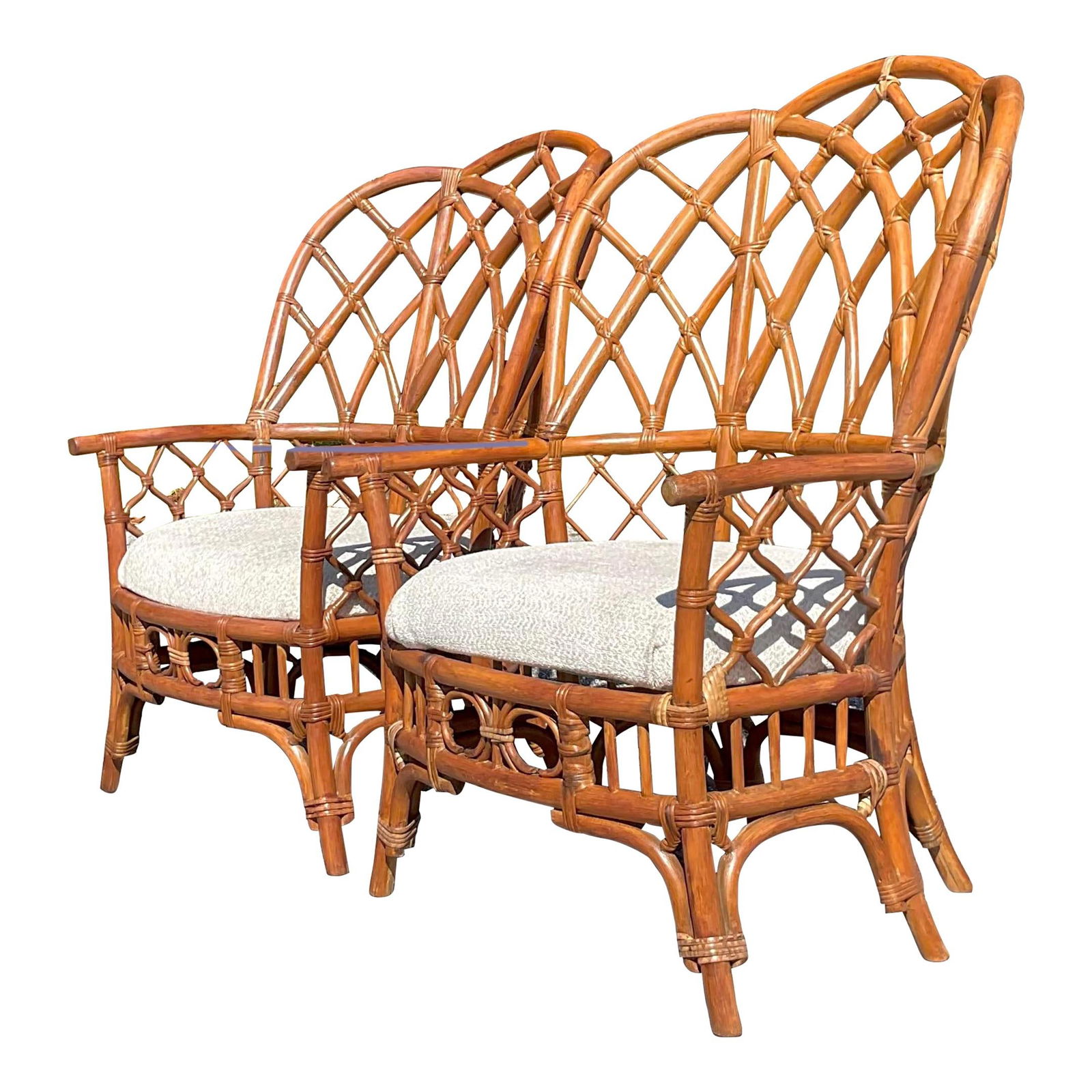Pair of Vintage Bent Rattan Wingback Chairs Coastal Charm: Pair of Vintage Bent Rattan Wingback Chairs Coastal Charm Experience the coastal charm and timeless elegance of this delightful pair of Vintage Bent Rattan Wingback Chairs. Expertly crafted with intri