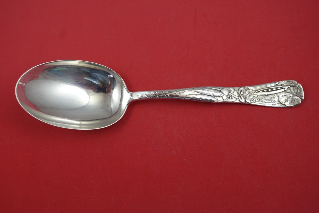 Tiffany & Co Vine Sterling Silver Serving Spoon Peapod 9.5 inch: Tiffany & Co Vine Sterling Silver Serving Spoon Peapod 9.5 inch This exquisite vegetable serving spoon from the Vine pattern by Tiffany & Co. is crafted in sterling silver and features a charming peap