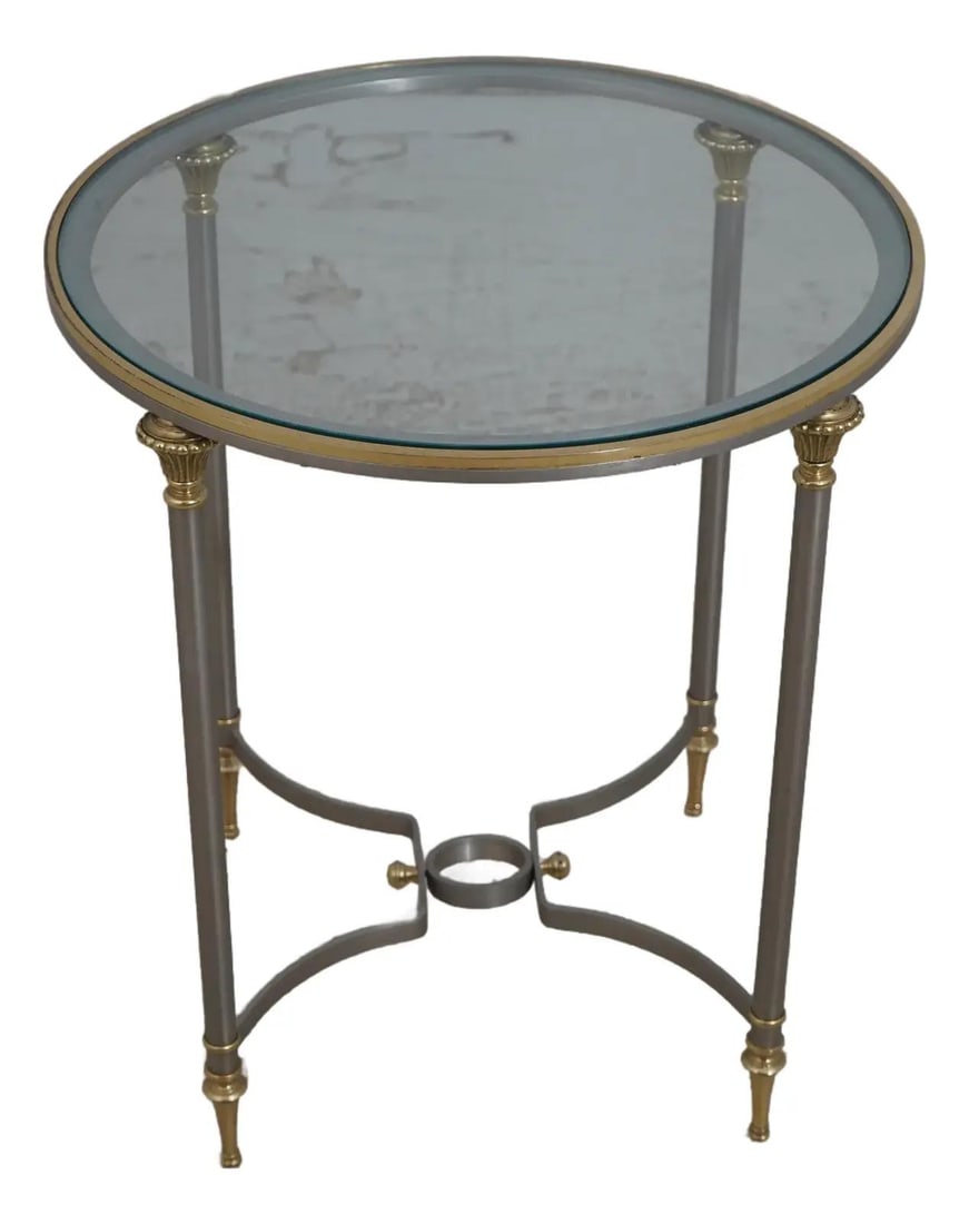Hollywood Regency Brass and Steel Glass Top Side Table: Hollywood Regency Brass and Steel Glass Top Side Table This Hollywood Regency side table is a stunning piece that combines style and functionality. Crafted approximately 40 years ago, it showcases hig
