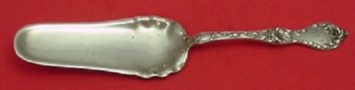 Reed & Barton Les Cinq Fleurs Sterling Silver Jelly Trowel 7 3/4": Reed & Barton Les Cinq Fleurs Sterling Silver Jelly Trowel 7 3/4" This exquisite jelly trowel, measuring 7 3/4 inches, is crafted from high-quality sterling silver and features the elegant Les Cinq Fl