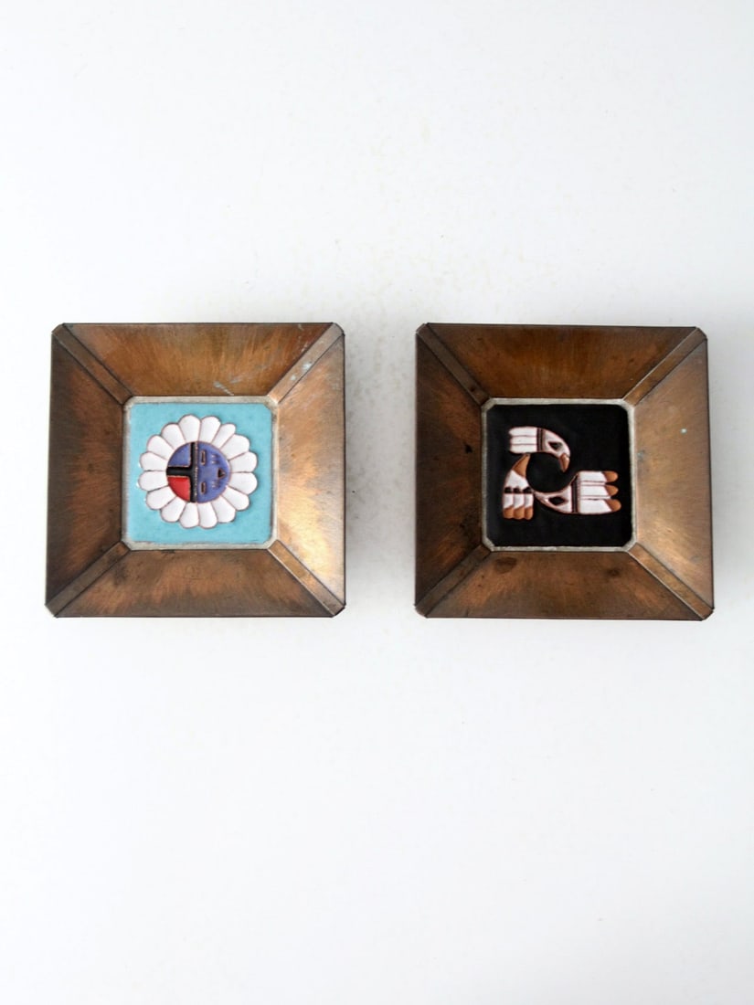 Vintage Desert House Crafts Copper Framed Tile Pair 1950s Zuni Sun Eagle: Vintage Desert House Crafts Copper Framed Tile Pair 1950s Zuni Sun Eagle This pair of vintage tiles from Desert House Crafts, dating back to the 1950s-1960s, features exquisite central enameled design