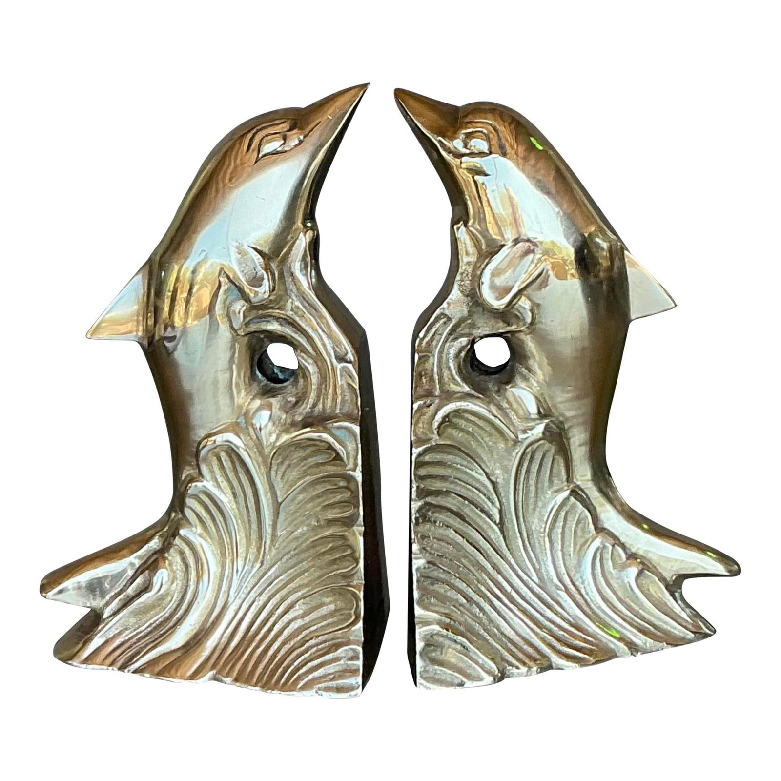Vintage Polished Brass Dolphin Bookends Nautical Elegance Pair: Vintage Polished Brass Dolphin Bookends Nautical Elegance Pair Enhance your decor with this vintage pair of polished brass dolphin bookends. Each piece features elegantly sculpted dolphins rising from