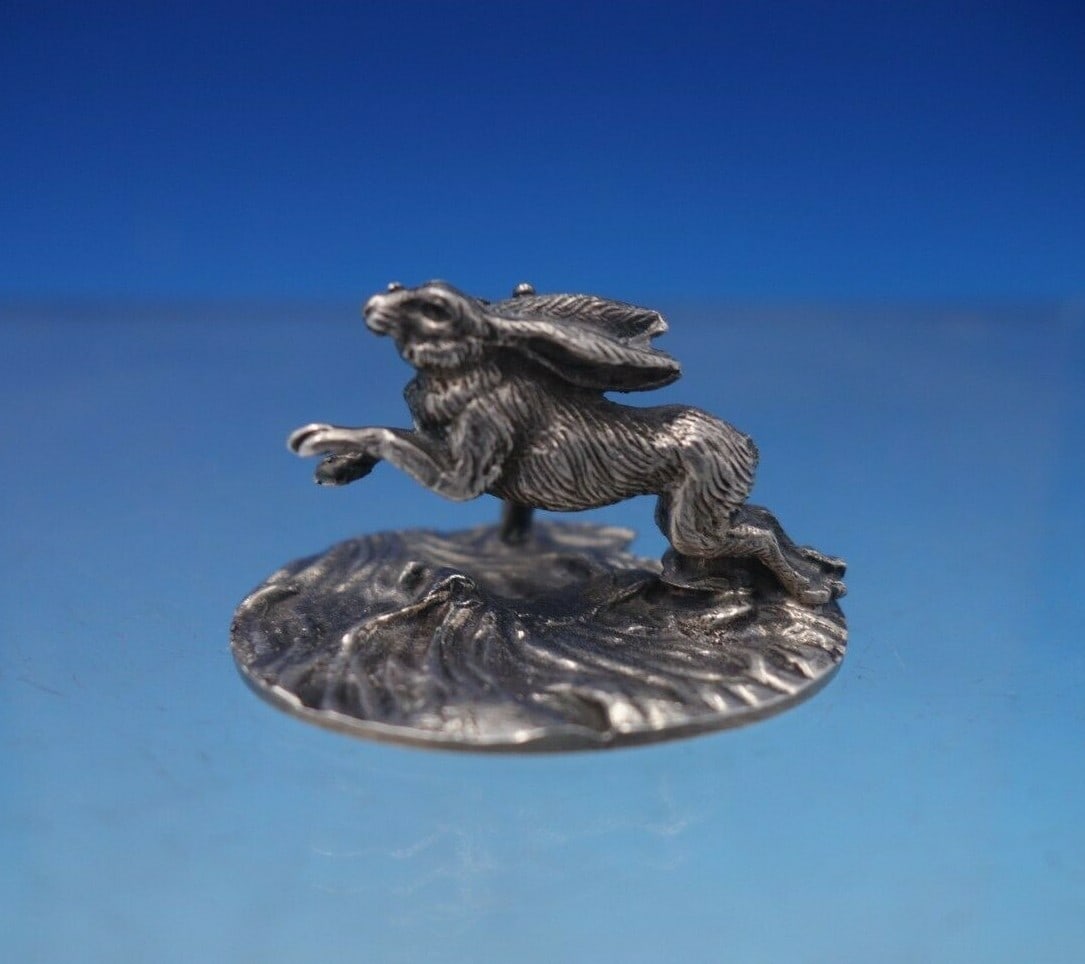 Charming English .800 Silver Rabbit Place Card Holder 3/4" x 1 3/8" x 1": Charming English .800 Silver Rabbit Place Card Holder 3/4" x 1 3/8" x 1" This charming English .800 silver place card holder features a delightful rabbit figural design, perfect for adding a whimsical