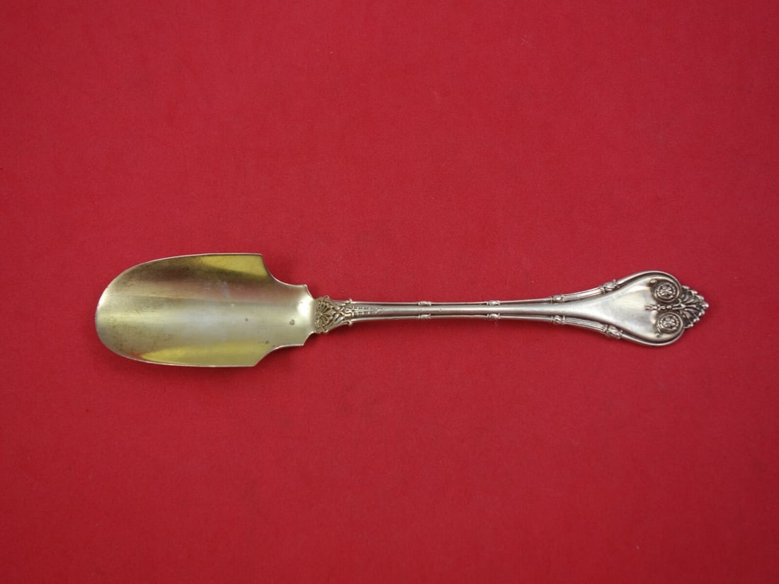 Whiting Empire Sterling Silver Cheese Scoop Gold Washed 6.25": Whiting Empire Sterling Silver Cheese Scoop Gold Washed 6.25" Discover the elegance of the Empire by Whiting cheese scoop, crafted from sterling silver and beautifully gold washed. This exquisite serv