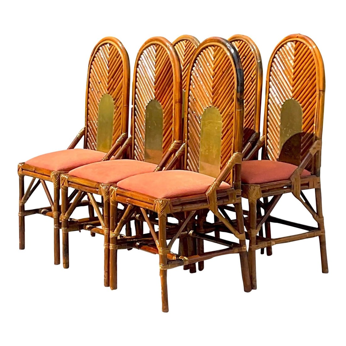 Vintage Rattan Brass Dining Chairs Set After Vivai Del Sud: Vintage Rattan Brass Dining Chairs Set After Vivai Del Sud This elegant set of vintage 1970s dining chairs features a chic arched design crafted from bent rattan, complemented by an inset brass plaque