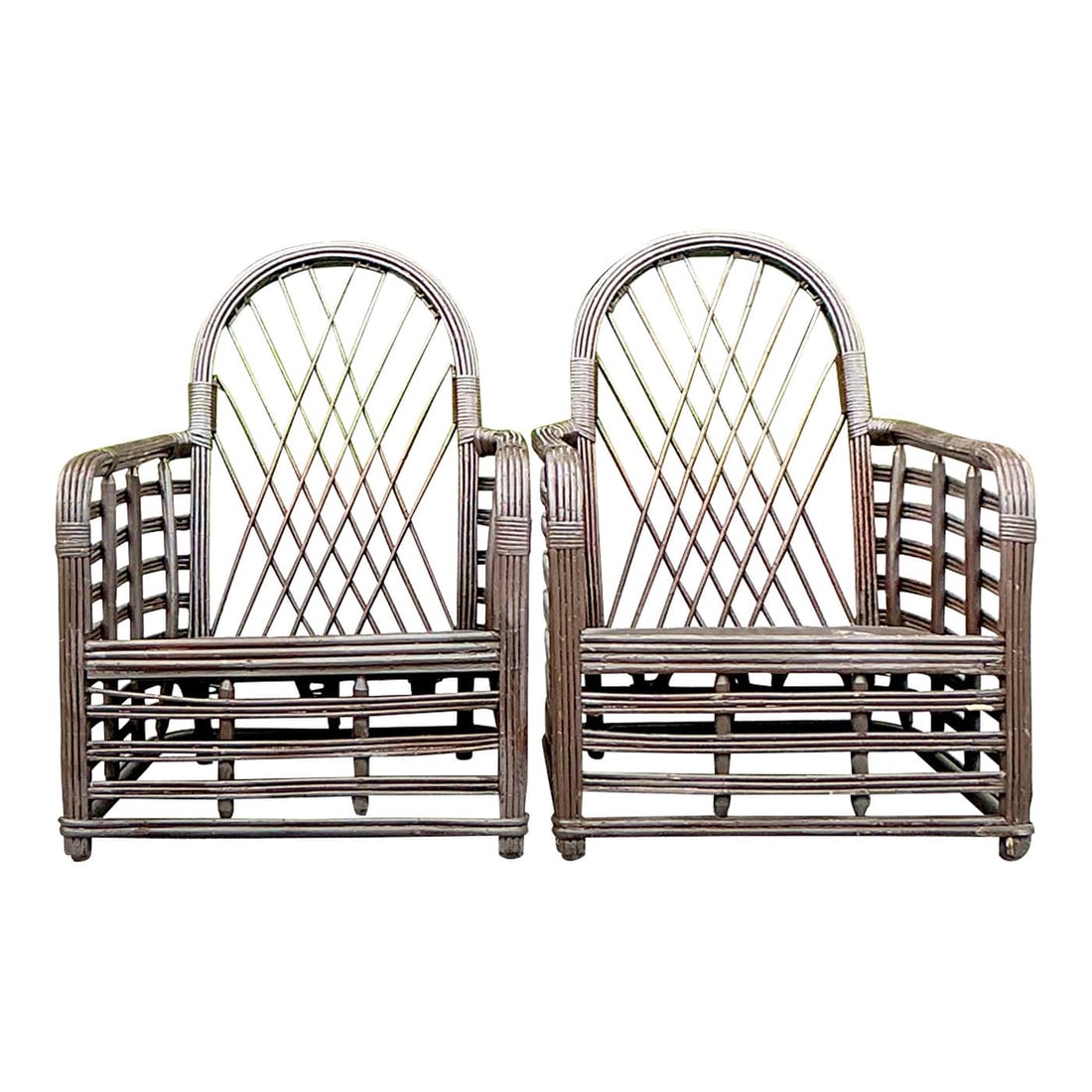 Elegant Vintage Coastal Rattan Lounge Chairs Pair Arched Design: Elegant Vintage Coastal Rattan Lounge Chairs Pair Arched Design Enhance your living space with this elegant pair of Vintage Coastal Arched Rattan Lounge Chairs. Designed in an American style, these ch