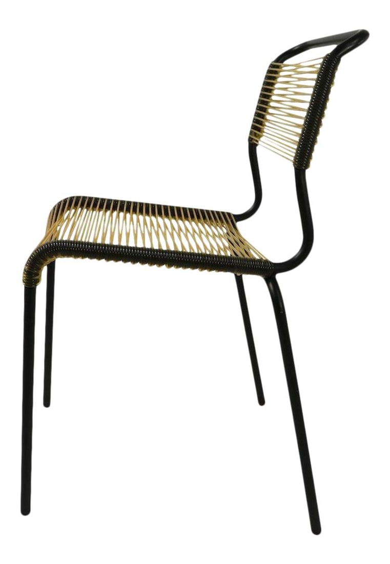 Mid Century Black Plastic String Chair Tubular Steel Frame Philippe Starck Style: Mid Century Black Plastic String Chair Tubular Steel Frame Philippe Starck Style This stylish mid-century side chair features a robust tubular steel frame complemented by a plastic string wrap for the