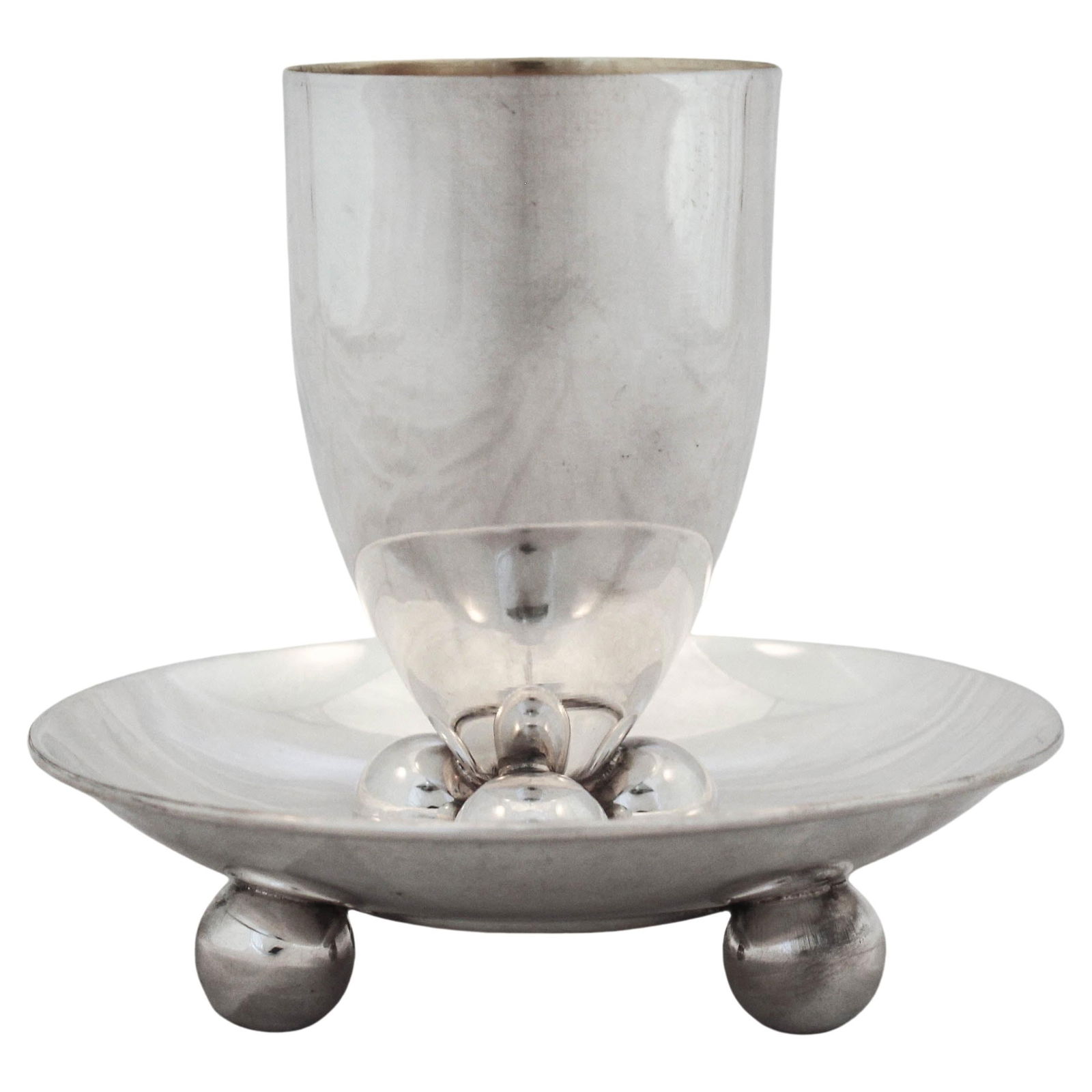 Modern Sterling Silver Kiddush Cup and Plate Set of 2 from Israel: Modern Sterling Silver Kiddush Cup and Plate Set of 2 from Israel Introduce elegance to your table with this stunning Sterling Kiddush Cup and Plate set. Crafted from high-quality sterling silver, thi