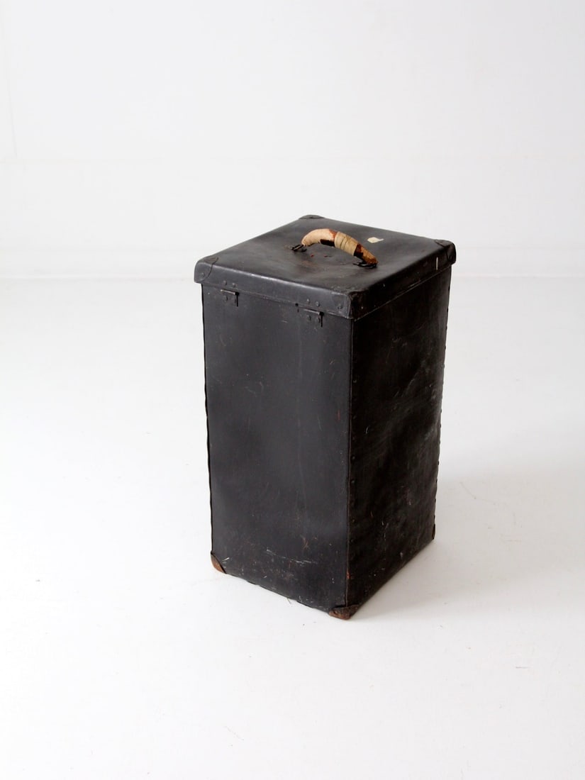 Early 20th Century Vintage Vulcanized Luggage Bin with Leather Handle: Early 20th Century Vintage Vulcanized Luggage Bin with Leather Handle This vintage vulcanized hardboard luggage bin dates back to the early 20th century. It features a tall design suitable for travele