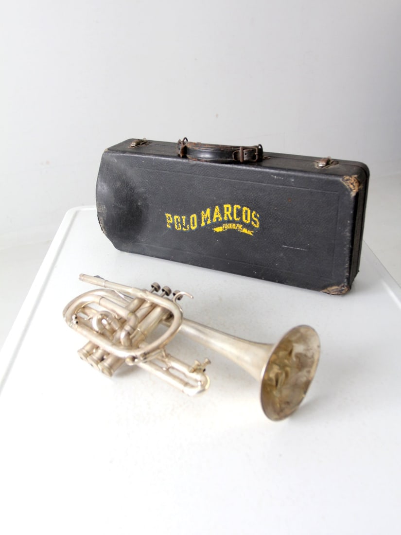 1940s Holton Collegiate Silver Plate Trumpet with Original Case: 1940s Holton Collegiate Silver Plate Trumpet with Original Case This 1940s Holton Collegiate silver-plate trumpet is a remarkable piece, complete with its original case featuring the Polo, IL "Polo Ma