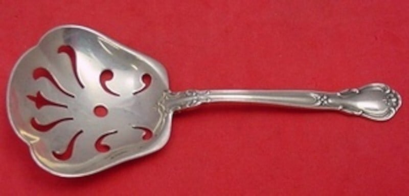 Gorham Chantilly Sterling Silver Nut Spoon 4 5/8 inch Serving Piece: Gorham Chantilly Sterling Silver Nut Spoon 4 5/8 inch Serving Piece This exquisite nut spoon from the Chantilly pattern by Gorham is crafted from high-quality sterling silver (.925). Measuring 4 5/8 i