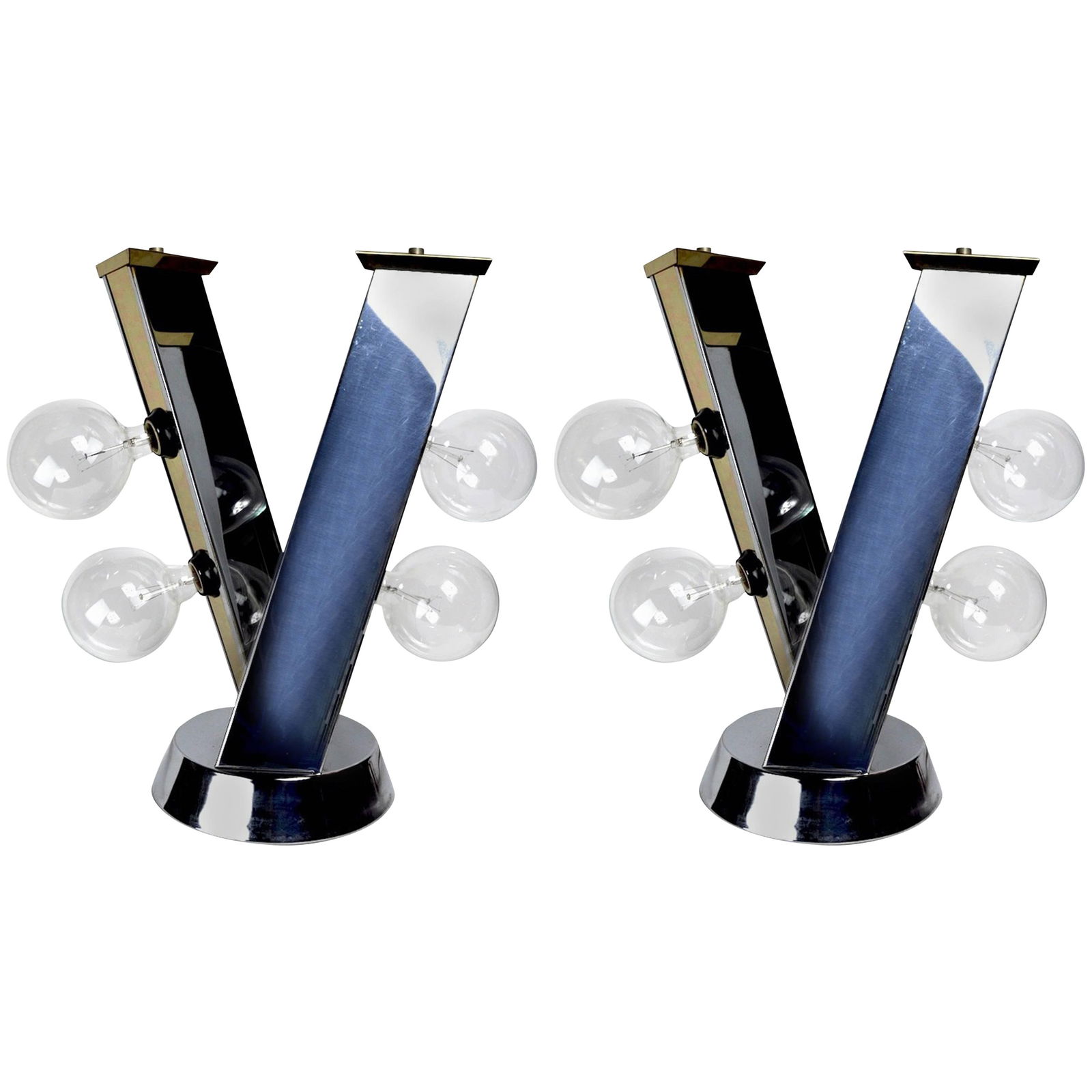 Cityscape Style Chrome and Brass Table Lamps Pair: Cityscape Style Chrome and Brass Table Lamps Pair This stunning pair of Cityscape style table lamps features a unique chrome and brass design that adds a modern touch to any space. Each lamp is shaped
