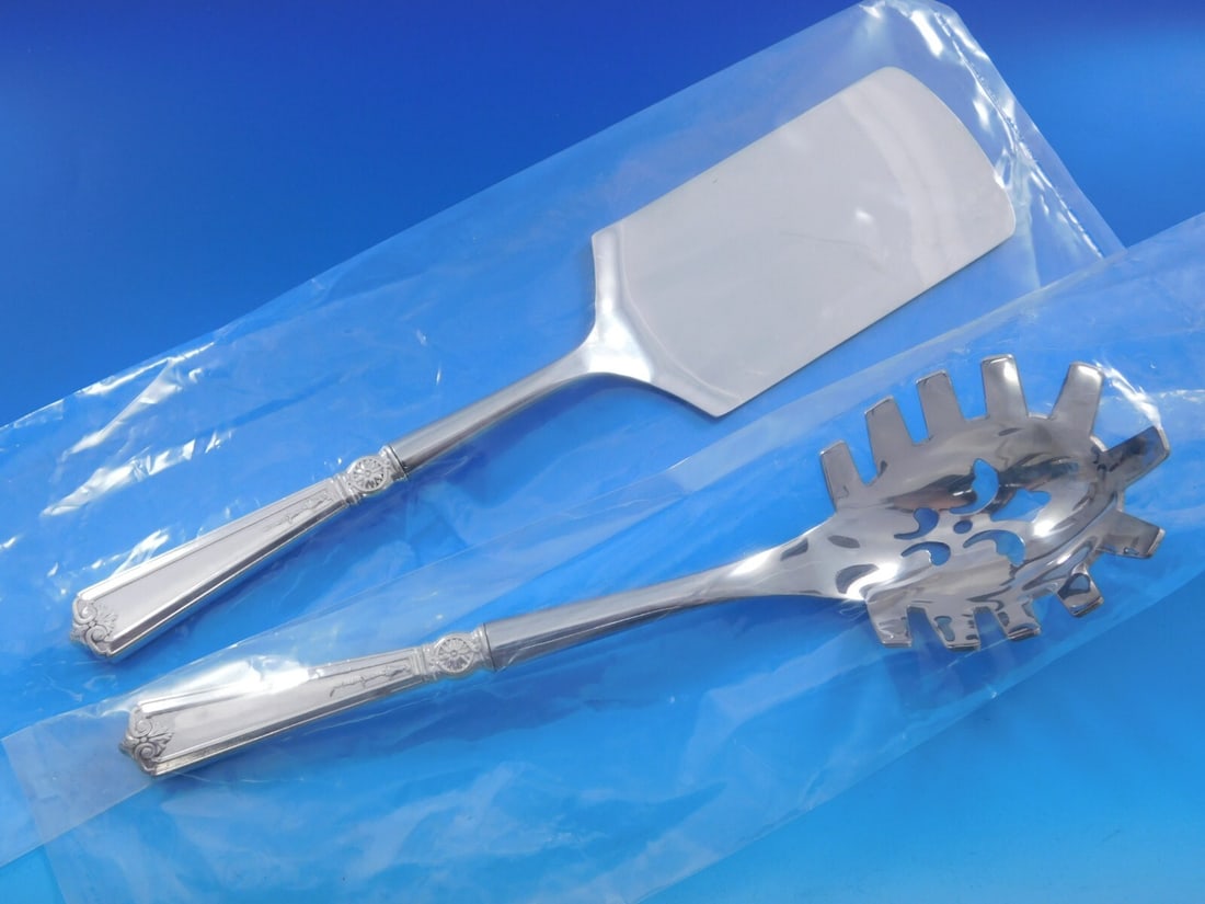 Durgin Victorian Sterling Silver 2pc Pasta Server Set Custom: Durgin Victorian Sterling Silver 2pc Pasta Server Set Custom Elevate your dining experience with this exquisite Victorian by Durgin Sterling Silver Italian Pasta Server Set. This custom-made two-piece
