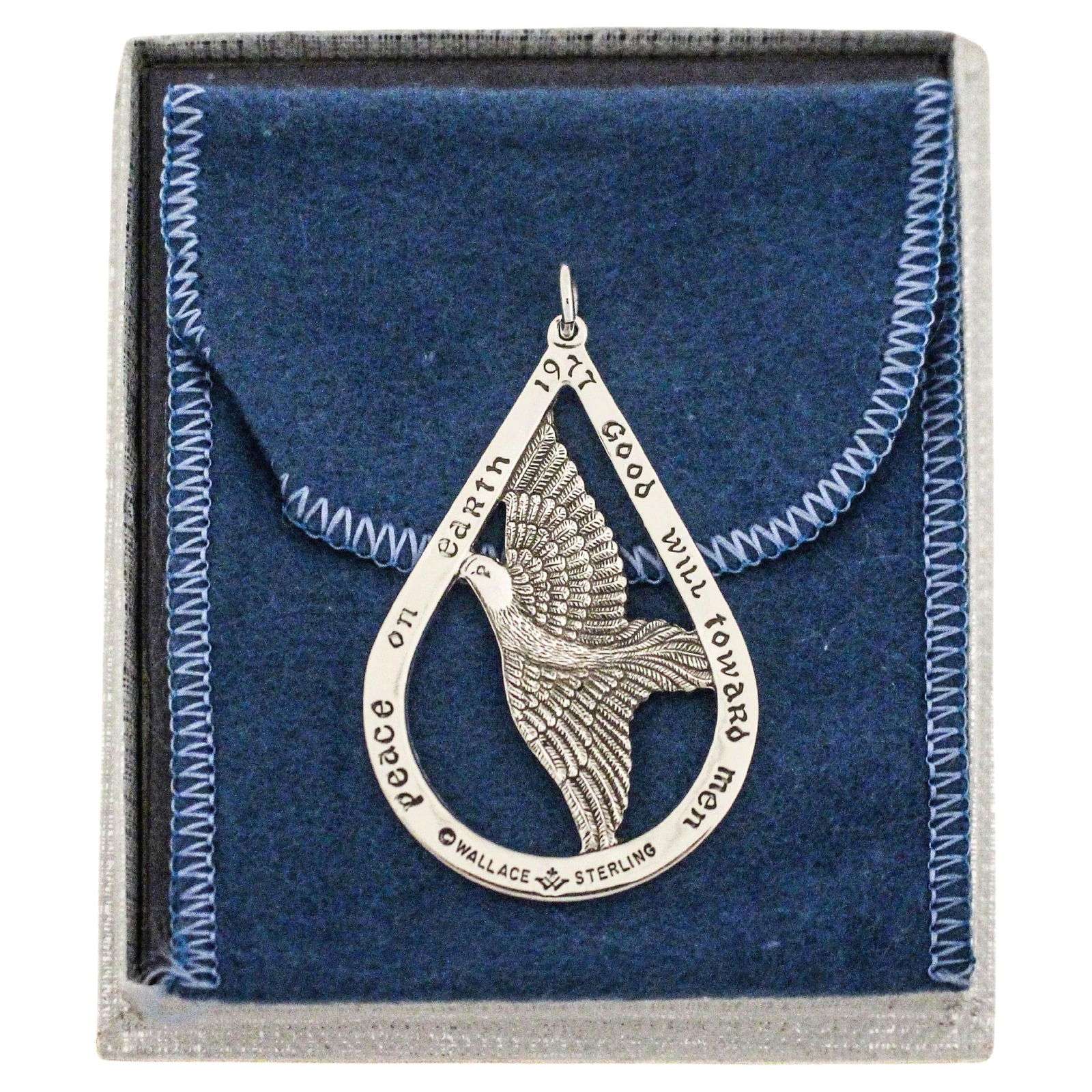 1977 Wallace Sterling Silver Christmas Ornament Dove Peace Medallion: 1977 Wallace Sterling Silver Christmas Ornament Dove Peace Medallion Celebrate the holiday season with this exquisite Sterling Silver Christmas Ornament, crafted by Wallace Silversmiths in 1977. This