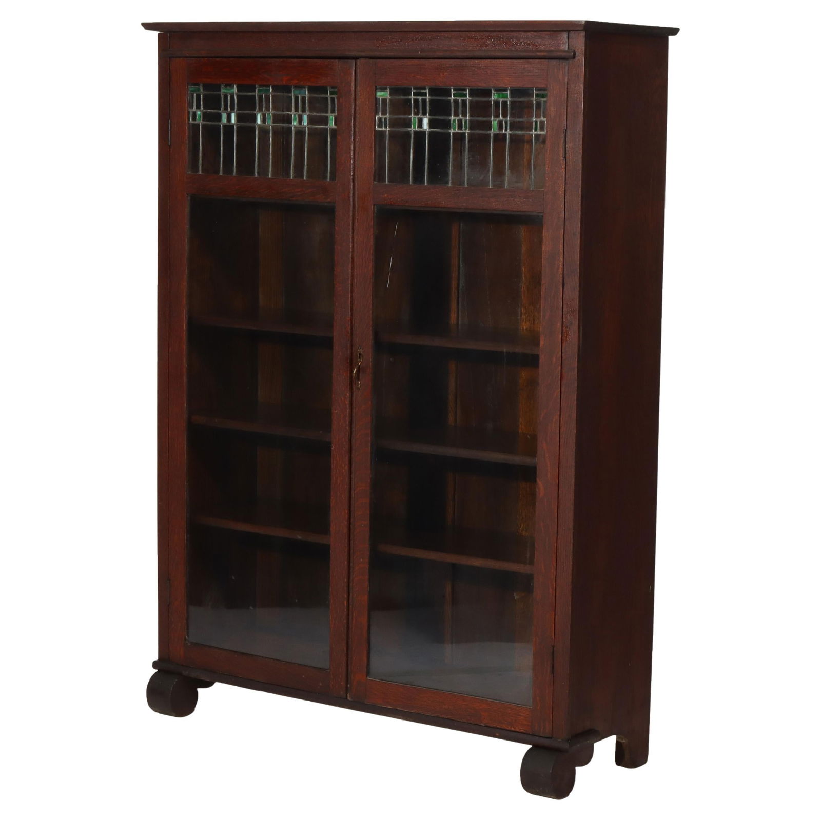 Vintage Arts and Crafts Oak Bookcase with Leaded Glass C1920: Vintage Arts and Crafts Oak Bookcase with Leaded Glass C1920 Discover this stunning Antique Arts & Crafts Oak Double Door Bookcase, crafted circa 1920. This piece showcases a robust oak construction,