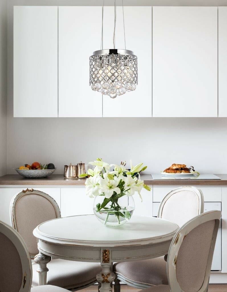 Living District Tully 4-Light Chrome Crystal Chandelier Pendant: Living District Tully 4-Light Chrome Crystal Chandelier Pendant Illuminate your space with this elegant Crystal Chandelier Pendant in a stunning chrome finish. Designed for various indoor areas includ